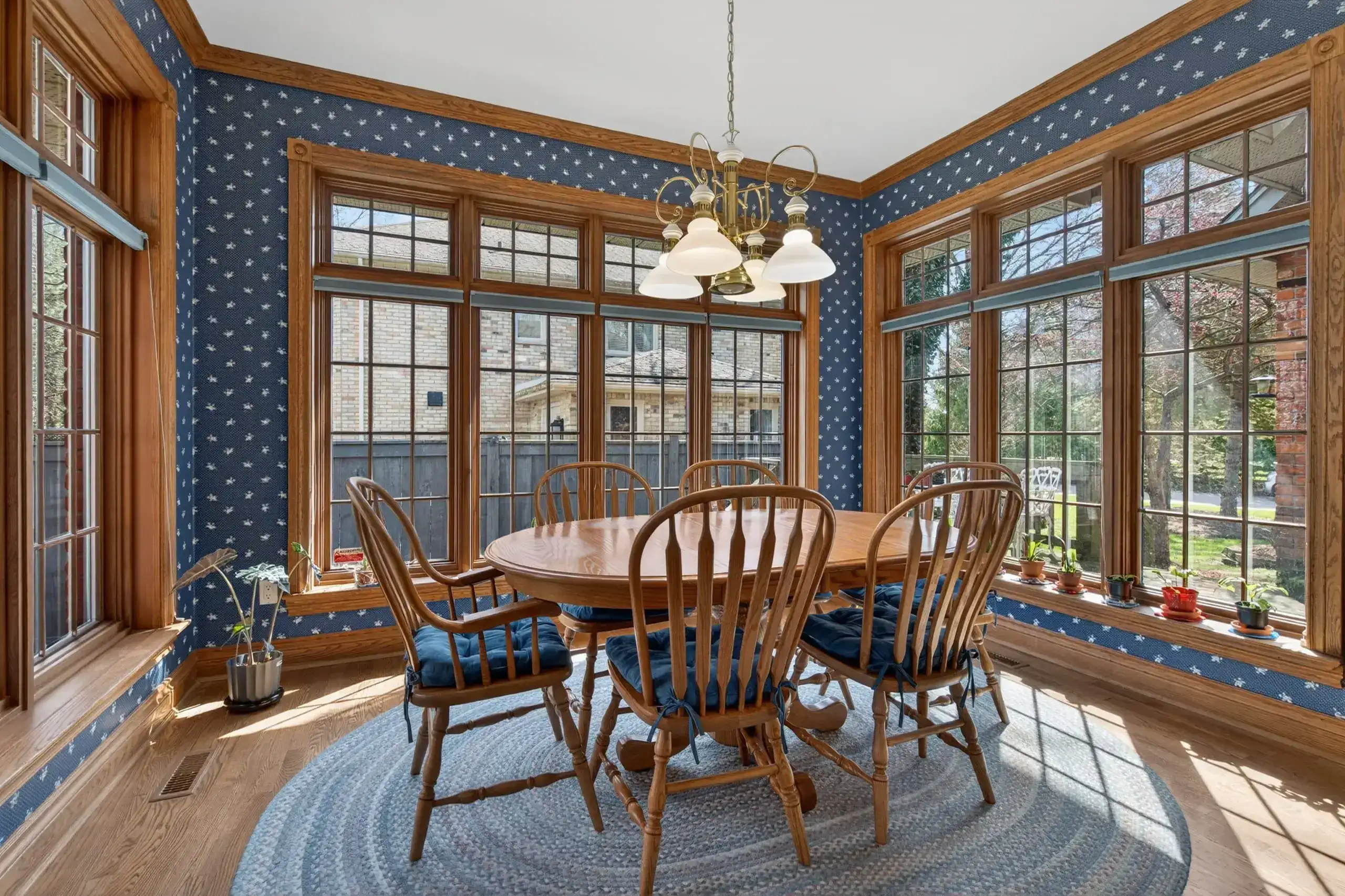 Sunroom dining room interior — real estate listing photography Southwestern Ontario