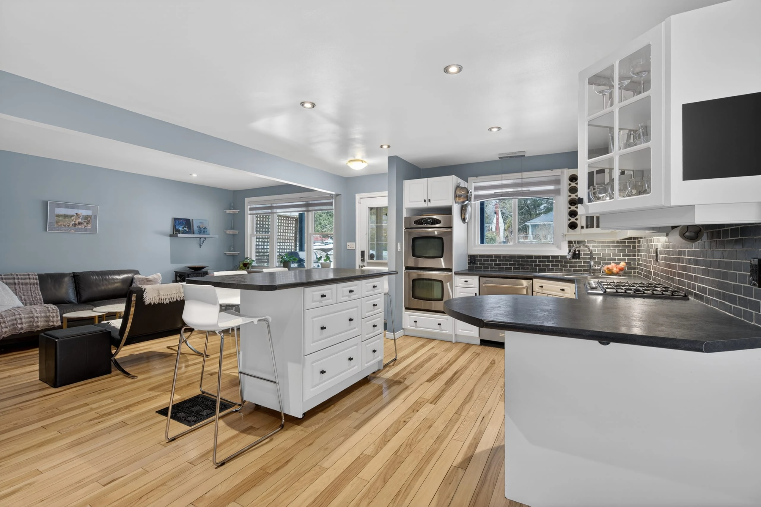 Open concept kitchen and living room — interior real estate photography London Ontario